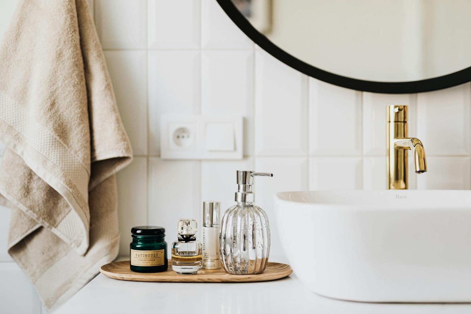 Modern bathroom counter with gold faucet
