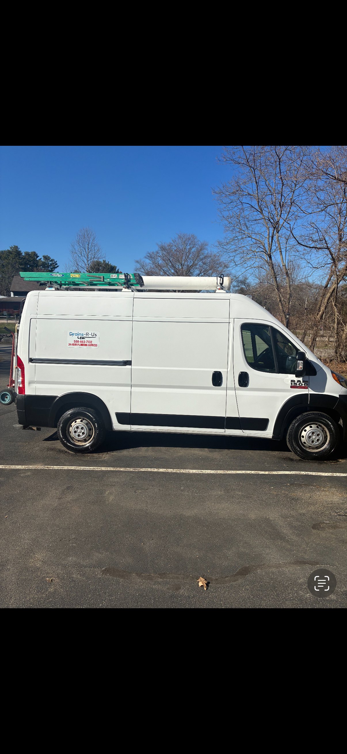 Drains-R-Us branded service van